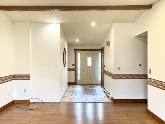 840 Lansberry Ct, Somerset Boro, PA 15501 - foyer entrance with a baseboard radiator, light wood-style flooring, and beam ceiling