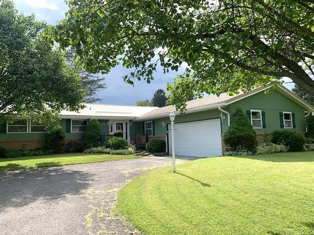 840 Lansberry Ct, Somerset Boro, PA 15501 - single story home with asphalt driveway, an attached garage, a front yard, and a metal roof