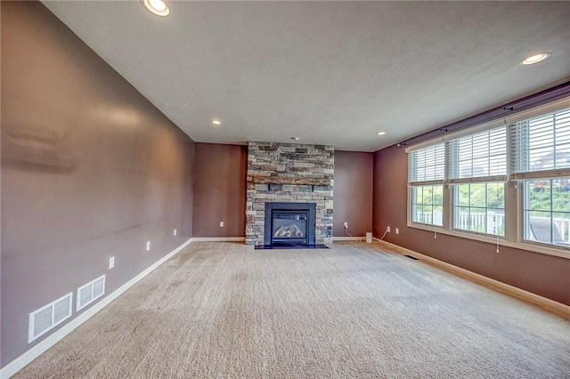 102 Bridal Ln, North Fayette, PA 15071 - unfurnished living room with a fireplace, carpet, recessed lighting, and a textured ceiling