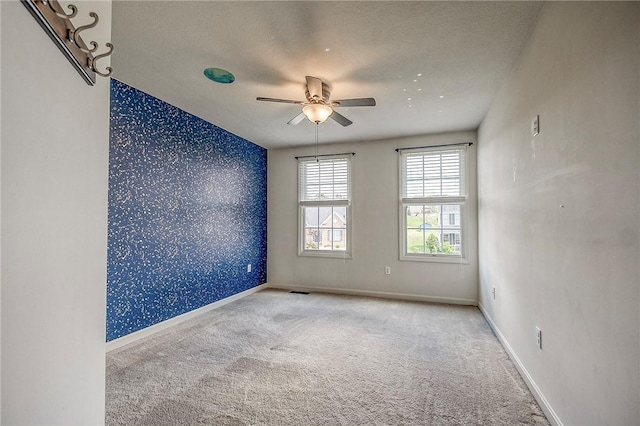 102 Bridal Ln, North Fayette, PA 15071 - carpeted spare room featuring wallpapered walls, ceiling fan, and a textured ceiling