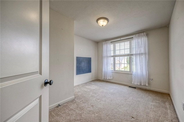 102 Bridal Ln, North Fayette, PA 15071 - spare room with carpet flooring and a textured ceiling