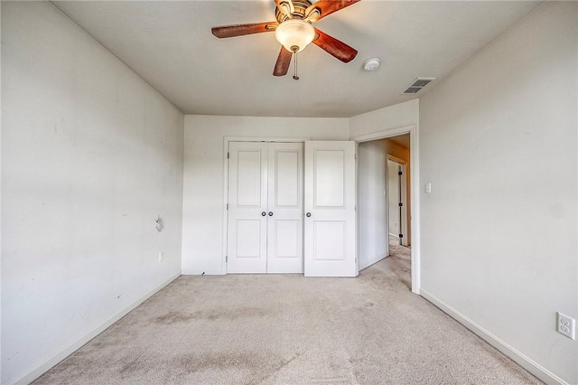 102 Bridal Ln, North Fayette, PA 15071 - unfurnished bedroom with light colored carpet, a ceiling fan, and a closet