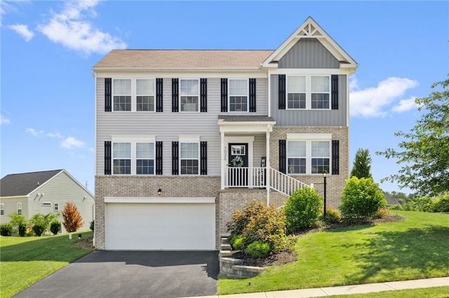 1026 Tee Line Dr, Hopewell Twp, PA 15001 - view of front of home with brick siding, an attached garage, a front yard, driveway, and board and batten siding