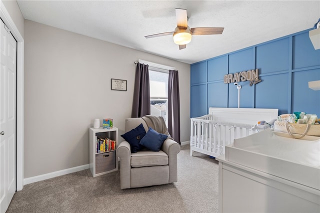 1026 Tee Line Dr, Hopewell Twp, PA 15001 - bedroom featuring light colored carpet, a nursery area, ceiling fan, and a closet