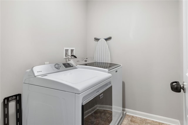 1026 Tee Line Dr, Hopewell Twp, PA 15001 - laundry room featuring washing machine and clothes dryer and baseboards