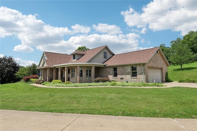 221 Scott Hollow Rd, Pa, PA 15021 - view of front facade featuring concrete driveway, a garage, brick siding, and a front lawn