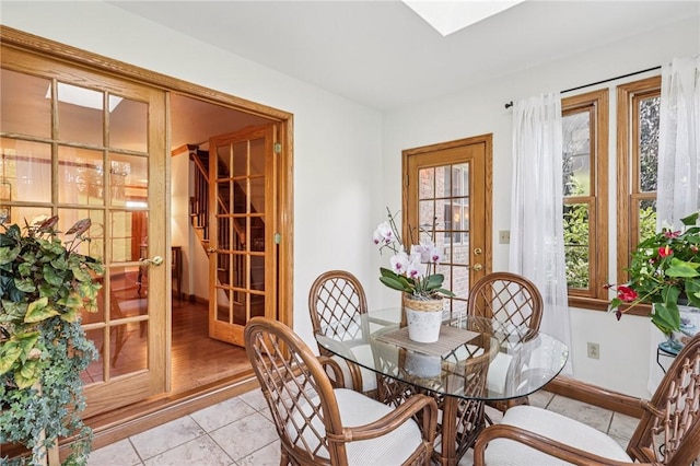 221 Scott Hollow Rd, Pa, PA 15021 - dining room featuring healthy amount of natural light, light tile patterned floors, and a skylight