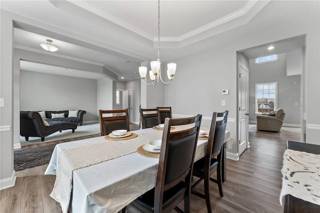 107 Valley View Dr, Brighton Twp, PA 15009 - dining area with dark wood-type flooring, a raised ceiling, crown molding, a chandelier, and recessed lighting