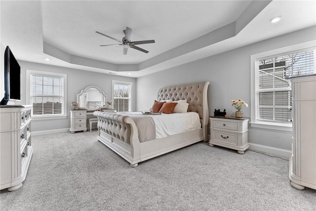 107 Valley View Dr, Brighton Twp, PA 15009 - bedroom featuring light colored carpet, a tray ceiling, multiple windows, recessed lighting, and a ceiling fan