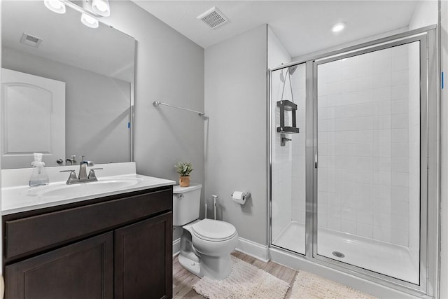 107 Valley View Dr, Brighton Twp, PA 15009 - bathroom with a stall shower, vanity, and wood finished floors
