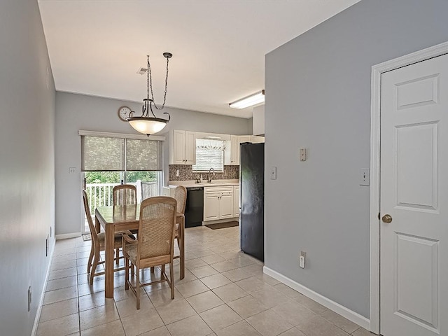 25 Elena Ave Unit 25, Lower Burrell, PA 15068 - dining space with baseboards and light tile patterned flooring
