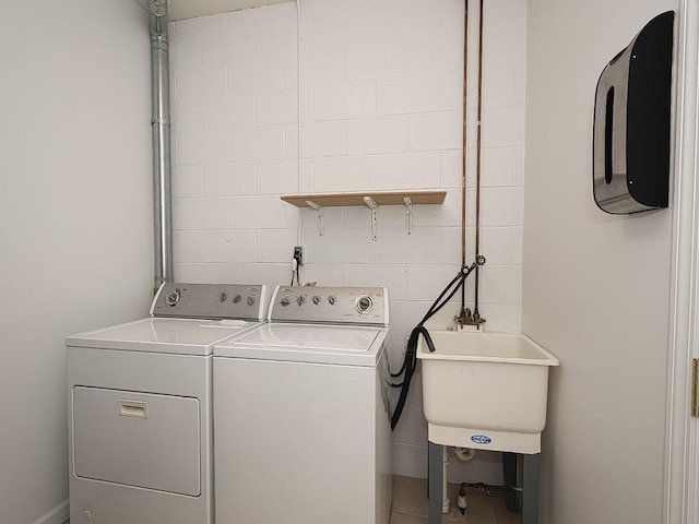 25 Elena Ave Unit 25, Lower Burrell, PA 15068 - laundry area with separate washer and dryer and a sink