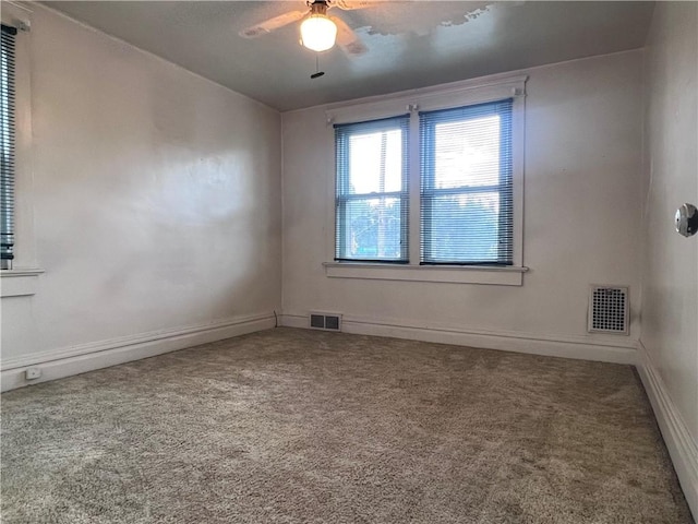 1613 E Washington St, New Castle, PA 16101 - carpeted empty room featuring a ceiling fan and baseboards