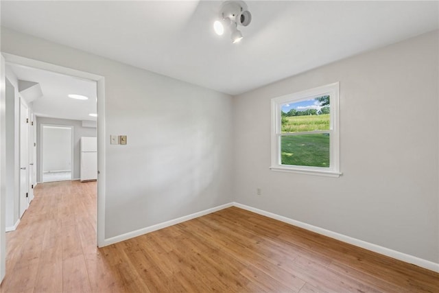 359 Meadow Spring Rd, Unity Twp, PA 15650 - unfurnished room with baseboards and light wood-type flooring