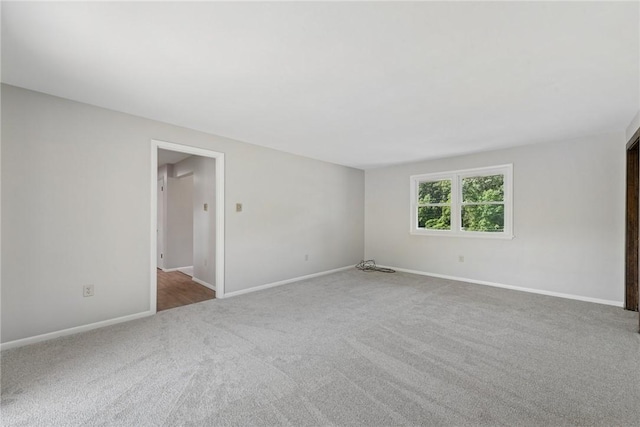 359 Meadow Spring Rd, Unity Twp, PA 15650 - carpeted empty room featuring baseboards