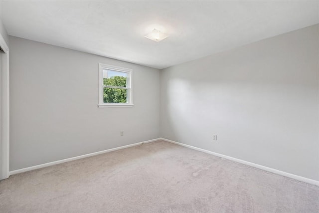 359 Meadow Spring Rd, Unity Twp, PA 15650 - unfurnished room featuring light carpet and baseboards
