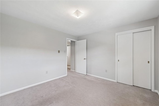 359 Meadow Spring Rd, Unity Twp, PA 15650 - unfurnished bedroom featuring light carpet and a closet