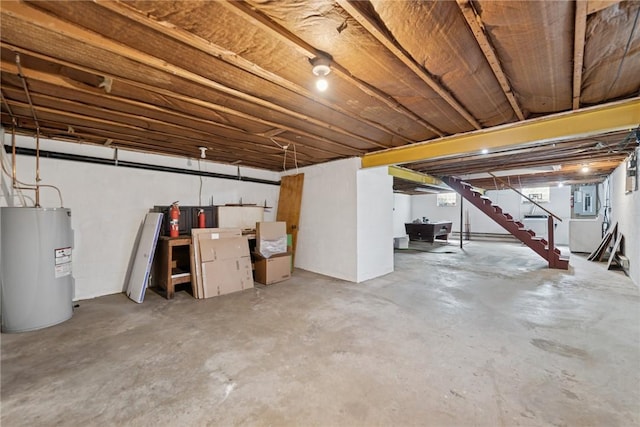 359 Meadow Spring Rd, Unity Twp, PA 15650 - basement with water heater, electric panel, and stairway