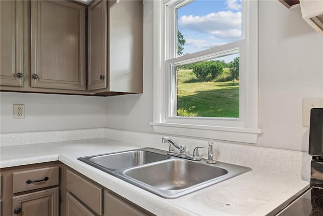 359 Meadow Spring Rd, Unity Twp, PA 15650 - kitchen featuring a sink and light countertops