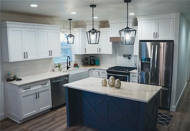 1053 Beaner Hollow Rd, Brighton Twp, PA 15009 - kitchen with appliances with stainless steel finishes, dark wood-type flooring, white cabinets, tasteful backsplash, and recessed lighting