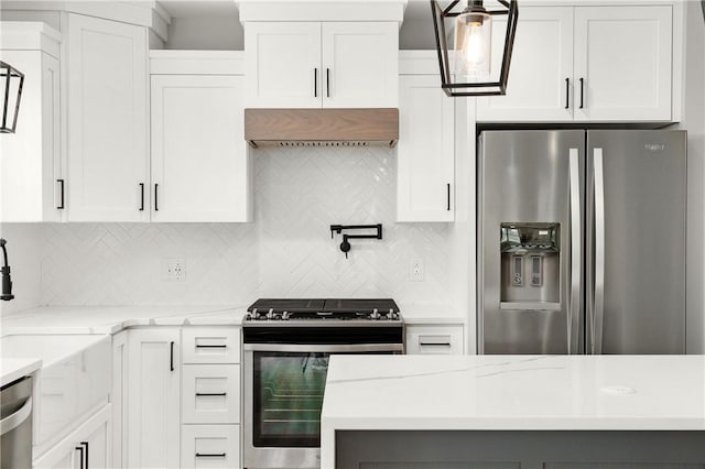 1053 Beaner Hollow Rd, Brighton Twp, PA 15009 - kitchen featuring appliances with stainless steel finishes, premium range hood, backsplash, white cabinetry, and pendant lighting