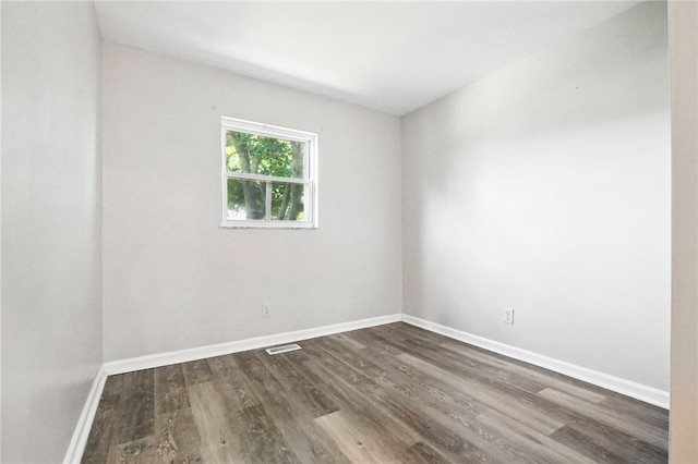 1014 Deerfield Dr, Elizabeth Twp/Boro, PA 15037 - unfurnished room featuring dark wood-style flooring and baseboards