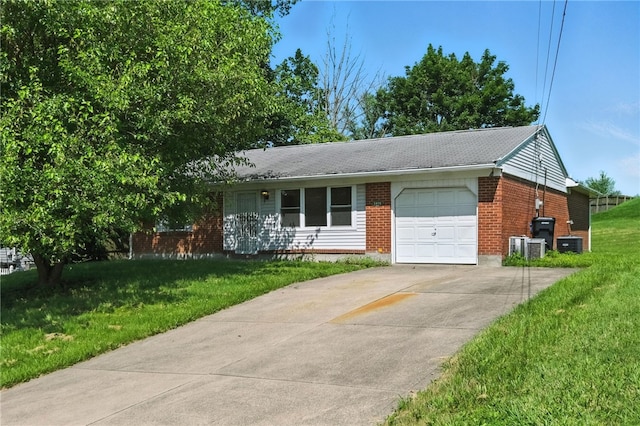 1014 Deerfield Dr, Elizabeth Twp/Boro, PA 15037 - view of front of property featuring a garage, brick siding, concrete driveway, and a front yard