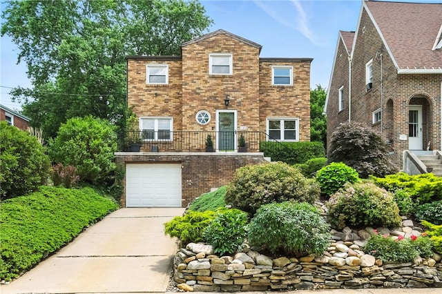 144 Cochran Mt, Lebanon, PA 15228 - view of front of property featuring brick siding, concrete driveway, and a garage