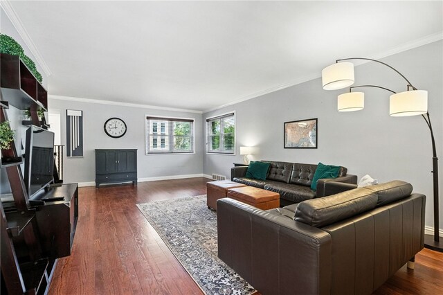 144 Cochran Mt, Lebanon, PA 15228 - living room featuring crown molding and dark wood-style flooring
