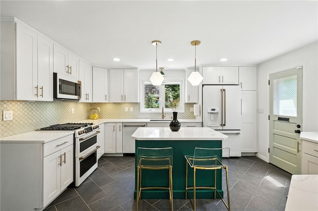 144 Cochran Mt, Lebanon, PA 15228 - kitchen featuring white appliances, white cabinets, backsplash, dark tile patterned flooring, and recessed lighting