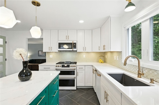 144 Cochran Mt, Lebanon, PA 15228 - kitchen featuring white appliances, dark tile patterned floors, white cabinets, backsplash, and recessed lighting