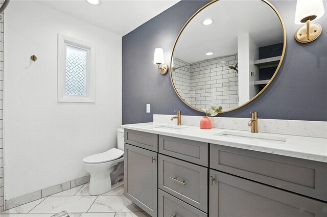 144 Cochran Mt, Lebanon, PA 15228 - bathroom featuring double vanity, marble finish floors, recessed lighting, and a tile shower