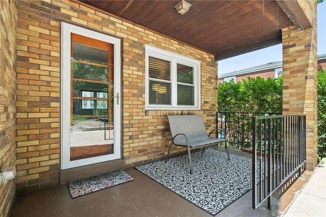 144 Cochran Mt, Lebanon, PA 15228 - doorway to property with a porch and brick siding