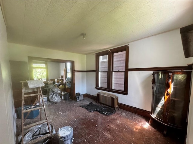 706 Lincoln St, Monongahela, PA 15063 - living room featuring radiator heating unit and baseboards