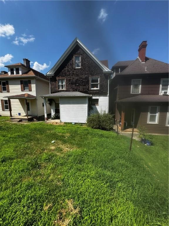 706 Lincoln St, Monongahela, PA 15063 - rear view of property with a yard