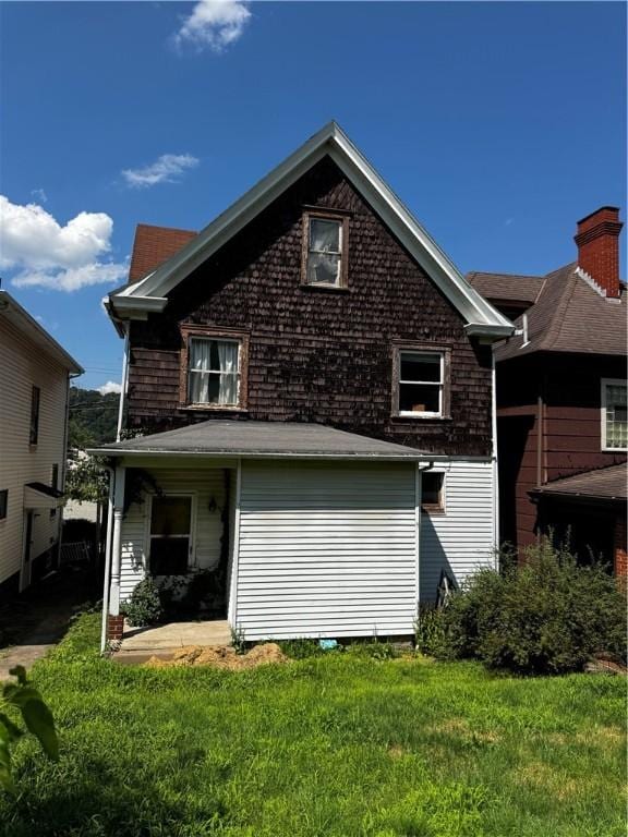 706 Lincoln St, Monongahela, PA 15063 - back of house with a lawn