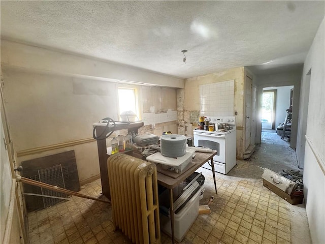 706 Lincoln St, Monongahela, PA 15063 - kitchen featuring white electric range oven, plenty of natural light, and a textured ceiling