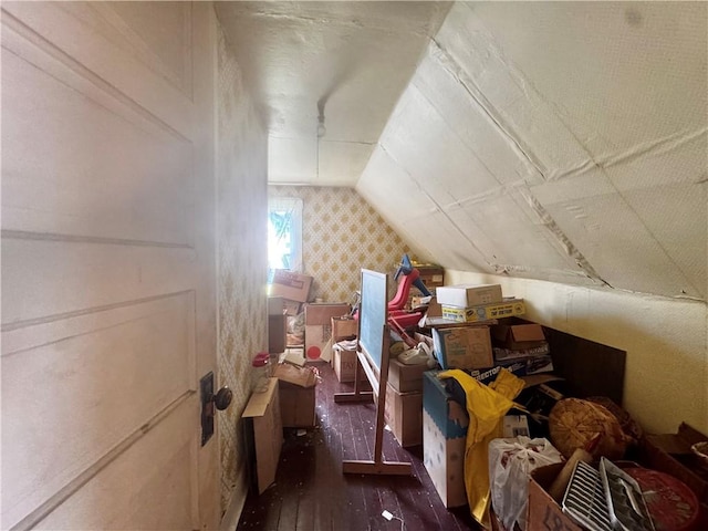 706 Lincoln St, Monongahela, PA 15063 - additional living space with dark wood-type flooring, wallpapered walls, and vaulted ceiling