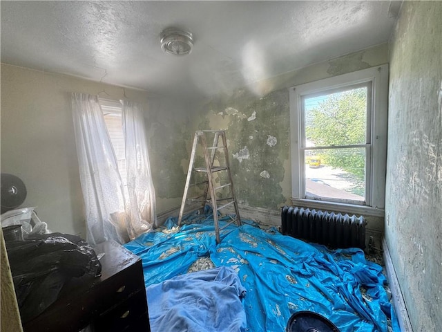 706 Lincoln St, Monongahela, PA 15063 - bedroom with radiator and a textured ceiling