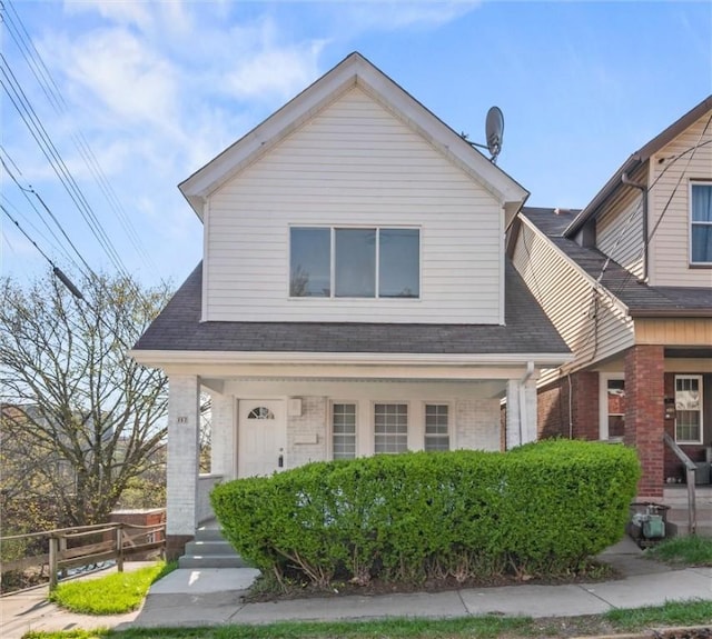 362 Marshall Ave, Observatory Hill, PA 15214 - view of front facade with covered porch, roof with shingles, and brick siding