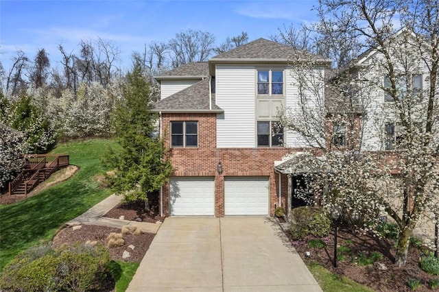 121 Fairway Landings Dr, Cecil, PA 15317 - traditional-style house with driveway, an attached garage, brick siding, a shingled roof, and a front lawn