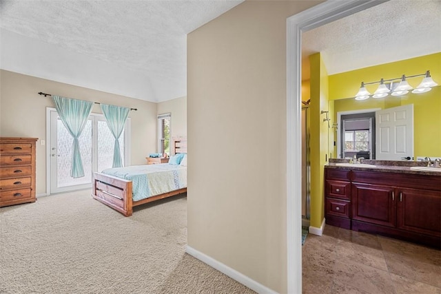 121 Fairway Landings Dr, Cecil, PA 15317 - bedroom featuring access to exterior, a textured ceiling, and light carpet