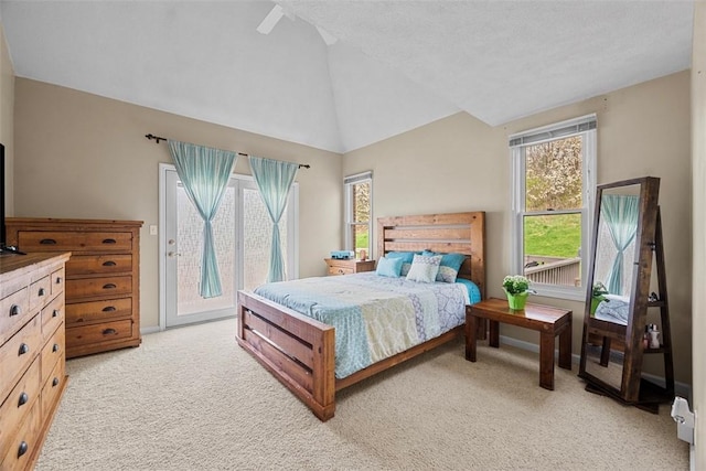 121 Fairway Landings Dr, Cecil, PA 15317 - bedroom featuring access to outside, light colored carpet, vaulted ceiling, and a ceiling fan