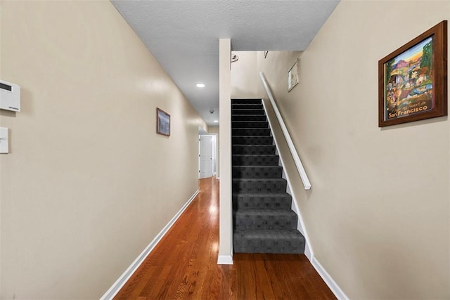 121 Fairway Landings Dr, Cecil, PA 15317 - staircase featuring wood finished floors and recessed lighting