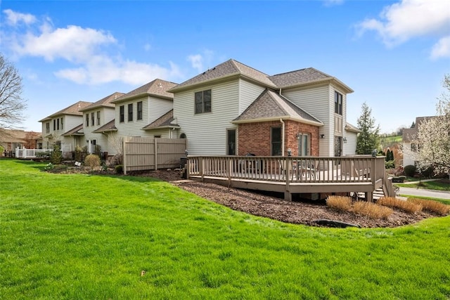 121 Fairway Landings Dr, Cecil, PA 15317 - rear view of property with a wooden deck, brick siding, a shingled roof, and a residential view