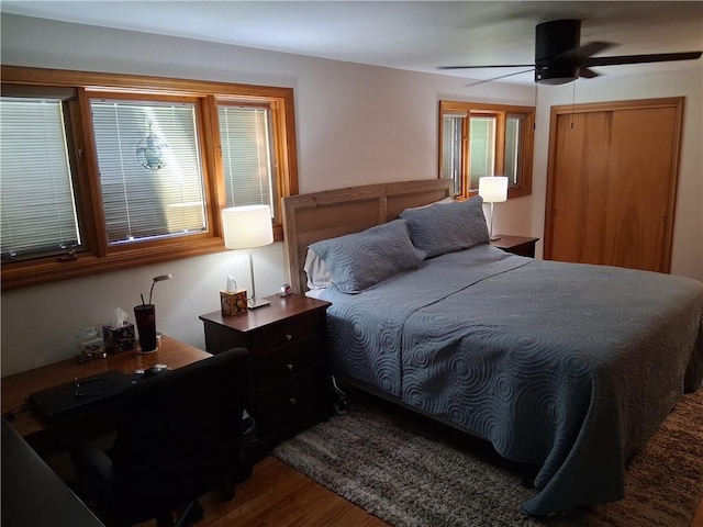 4977 Meadow Park Dr, Whitehall, PA 15236 - bedroom with wood finished floors and ceiling fan