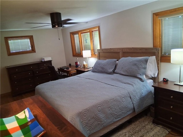 4977 Meadow Park Dr, Whitehall, PA 15236 - bedroom with wood finished floors and ceiling fan