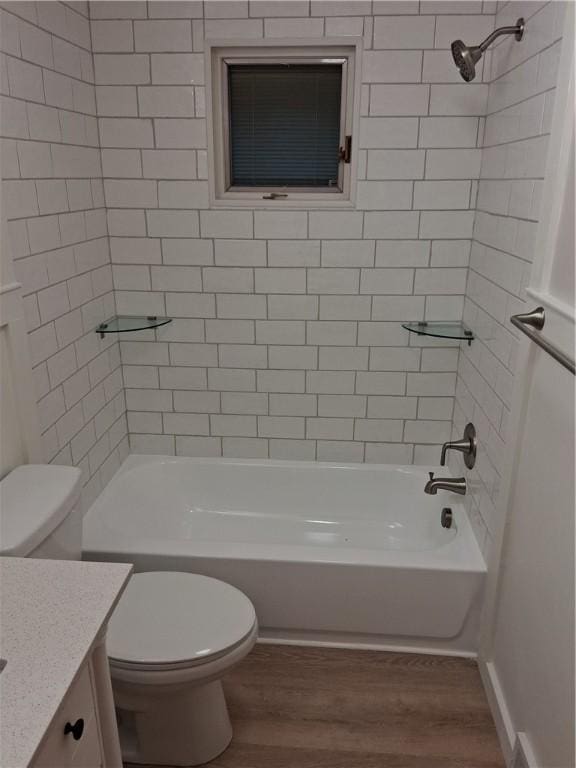 4977 Meadow Park Dr, Whitehall, PA 15236 - full bath with wood finished floors, vanity, and shower / bath combination
