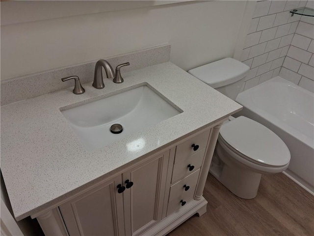 4977 Meadow Park Dr, Whitehall, PA 15236 - full bathroom featuring vanity, wood finished floors, and shower / bath combination