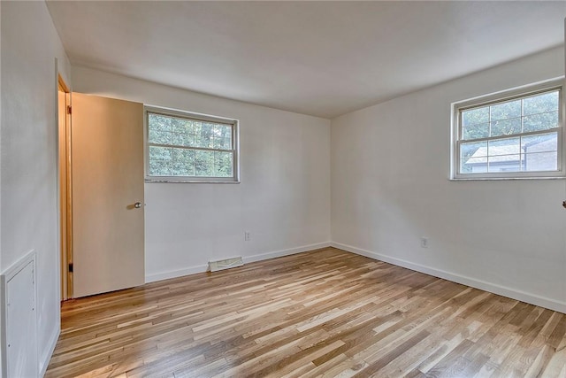 511 New Haven Dr, Hempfield Twp, PA 15601 - spare room with plenty of natural light and light wood-style floors